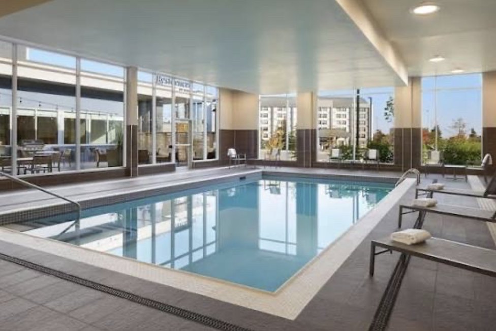The bright indoor pool used for Champions Swim School lessons